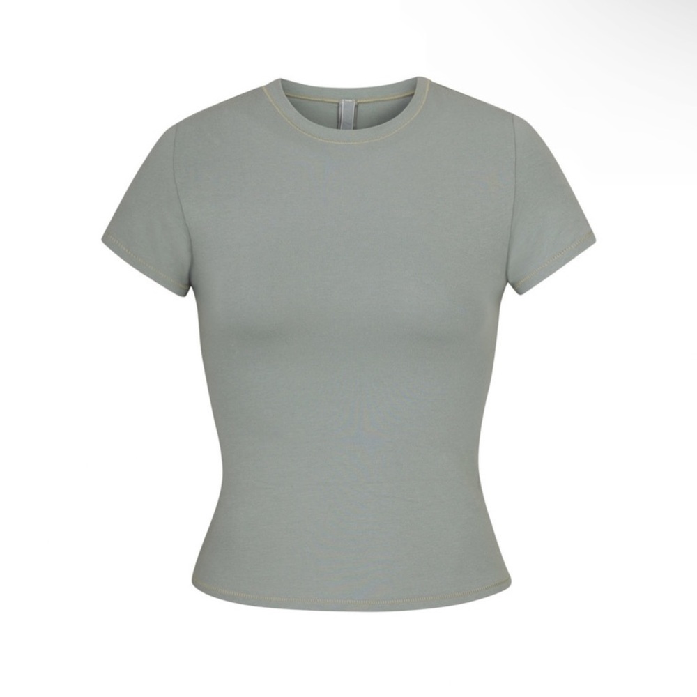 Skims top like new